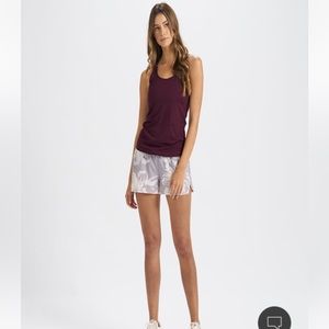 Vuori Lux Performance Tank in Cerise Heather. Size Medium.